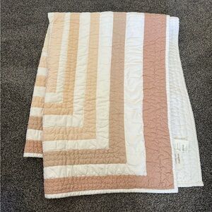 Faded Organic Clay Geometric Baby
Crib Quilt by Leanne Ford